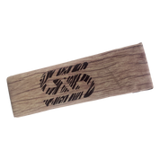 Rectangular woodchip fire log with natural grain texture and a black stylized logo printed on top.