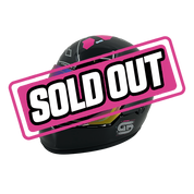 Glossy black mini helmet with a reflective rainbow visor and pink geometric details on top.