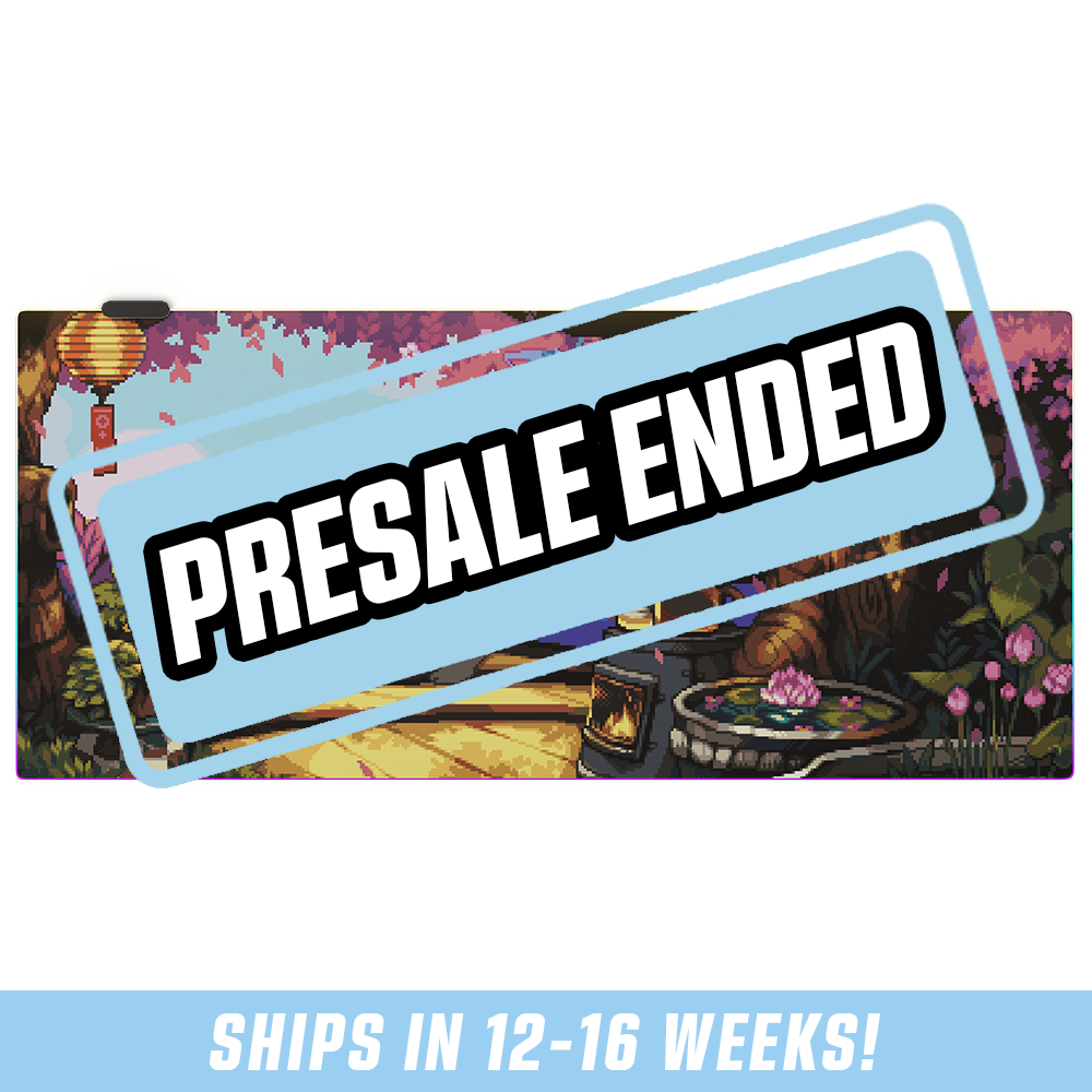 RGB mouse pad with pixel art of a blue-haired character sitting in a colorful garden under pink cherry blossoms.