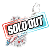 Keychain with blue-haired anime girl in a blue dress and red-striped stockings, surrounded by cards and a rabbit.