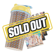 24oz shaker cup with yellow lid, blue and red pattern, and cartoon cats and dog illustration on the side.