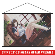 Wall scroll featuring a dark-haired anime girl in a blue dress lounging by a window with plants in the background.