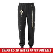 Black sweatpants with gold geometric lines on one leg and a gold emblem on the back pocket in 3XL size.