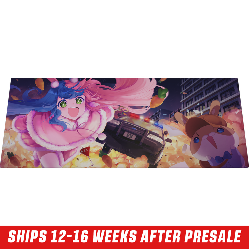 Mouse pad featuring a colorful anime girl with blue and pink hair wearing a pink fur-trimmed outfit on a wooden desk.