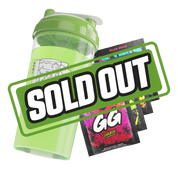 Green shaker cup with a drawing of a woman in a helmet and bikini top next to colorful energy drink packets.