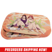 Rectangular tray with orange swirls featuring two women lounging with snacks and green leaf shapes behind them.