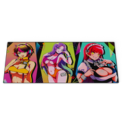 Mouse pad with three anime-style female characters in colorful outfits and vibrant geometric backgrounds.